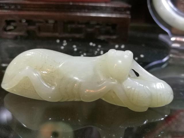 请专家们看看我这块和田玉挂仵好吗？大约值多少钱？-第2张图片-翡翠网