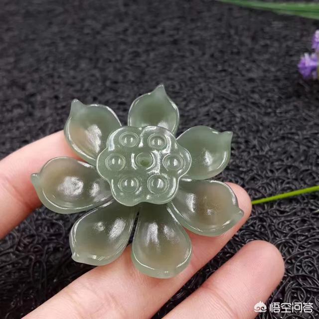 如何品鉴玉雕中的莲花文化？-第2张图片-翡翠网